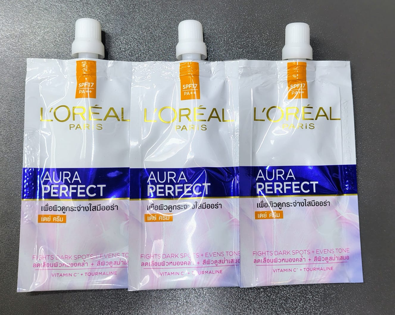 Loreal Aura Perfect cream bag